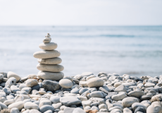 Pile of stones balancing on a beach