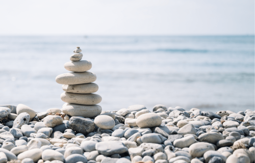 Pile of stones balancing on a beach